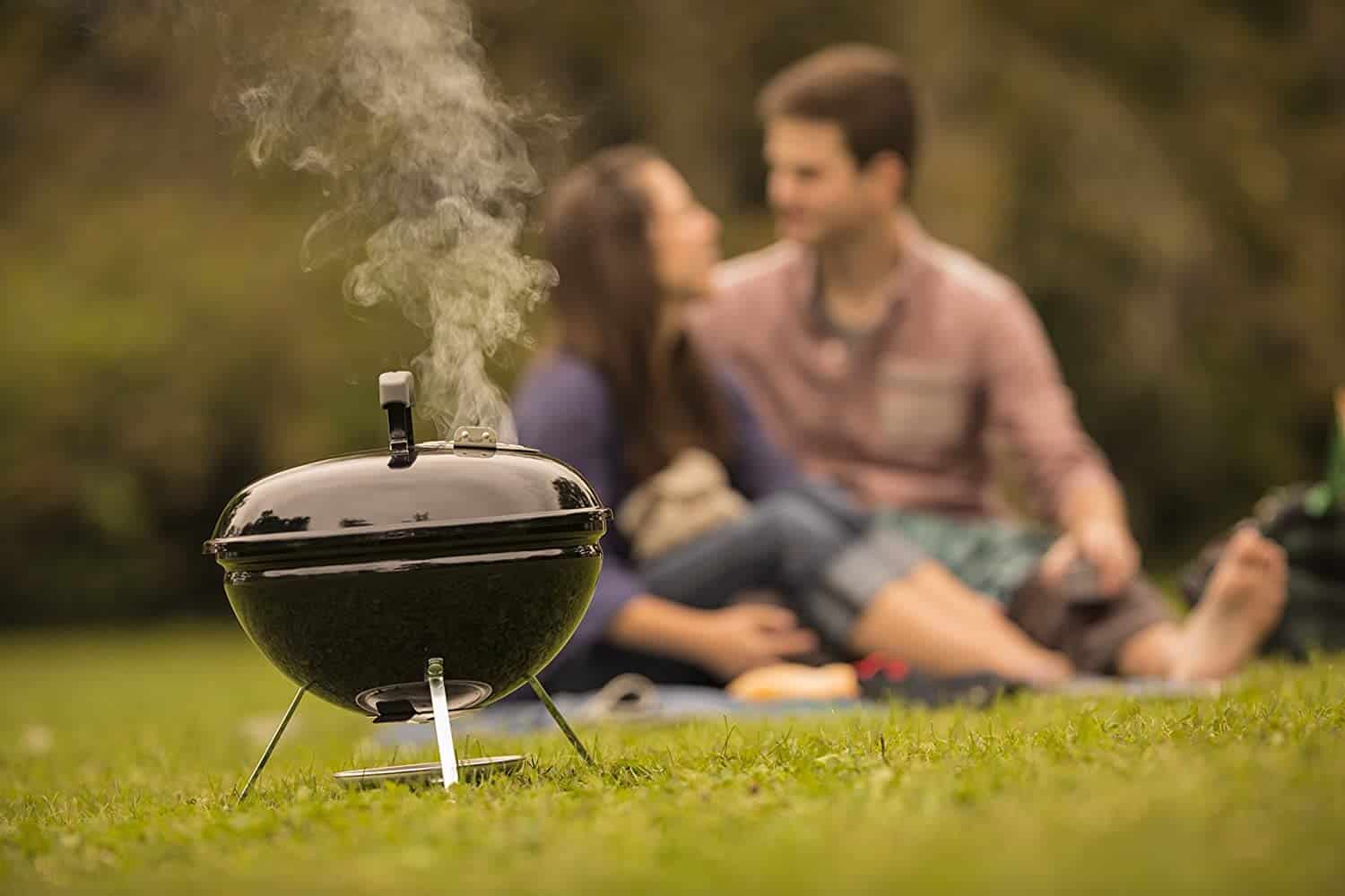 Best small charcoal grill for mobility- Weber Smokey Joe in the garden