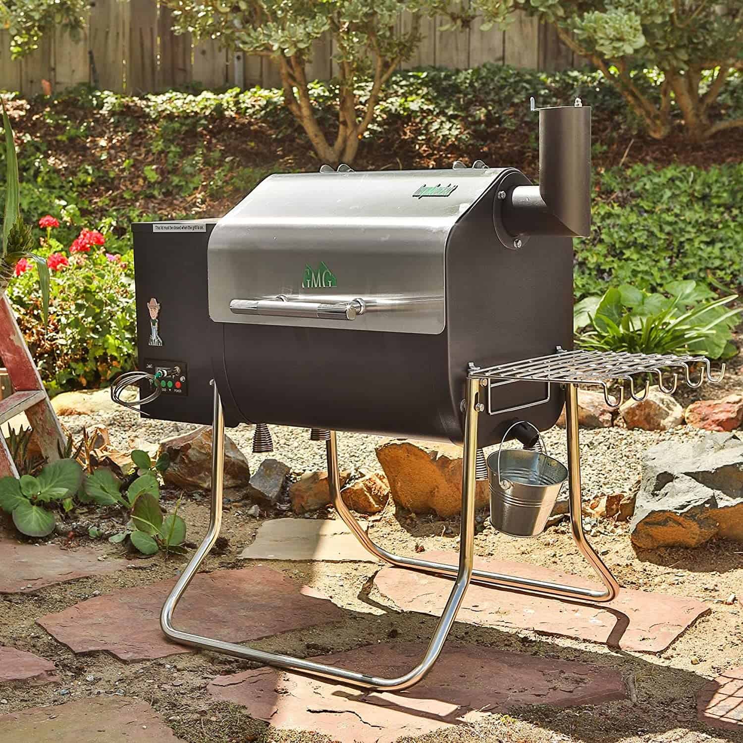 Best small pellet grill for smoking and grilling- GMG Davy Crockett in the garden