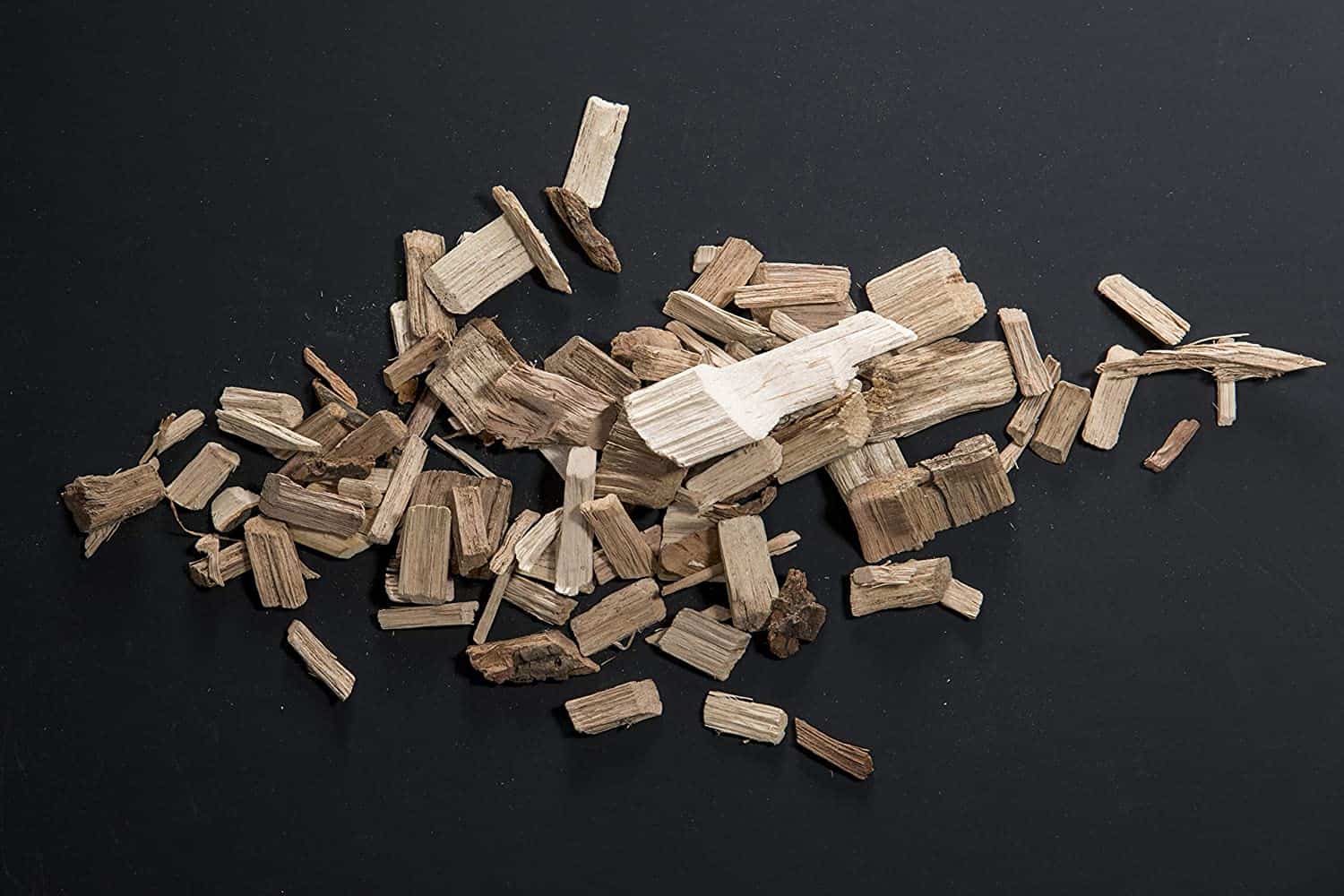 Apple wood is best for smoking ham to get a balanced and sweet flavor