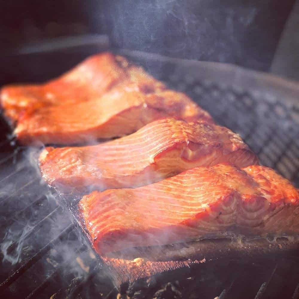 Using cedar planks for grilling salmon in your smoker